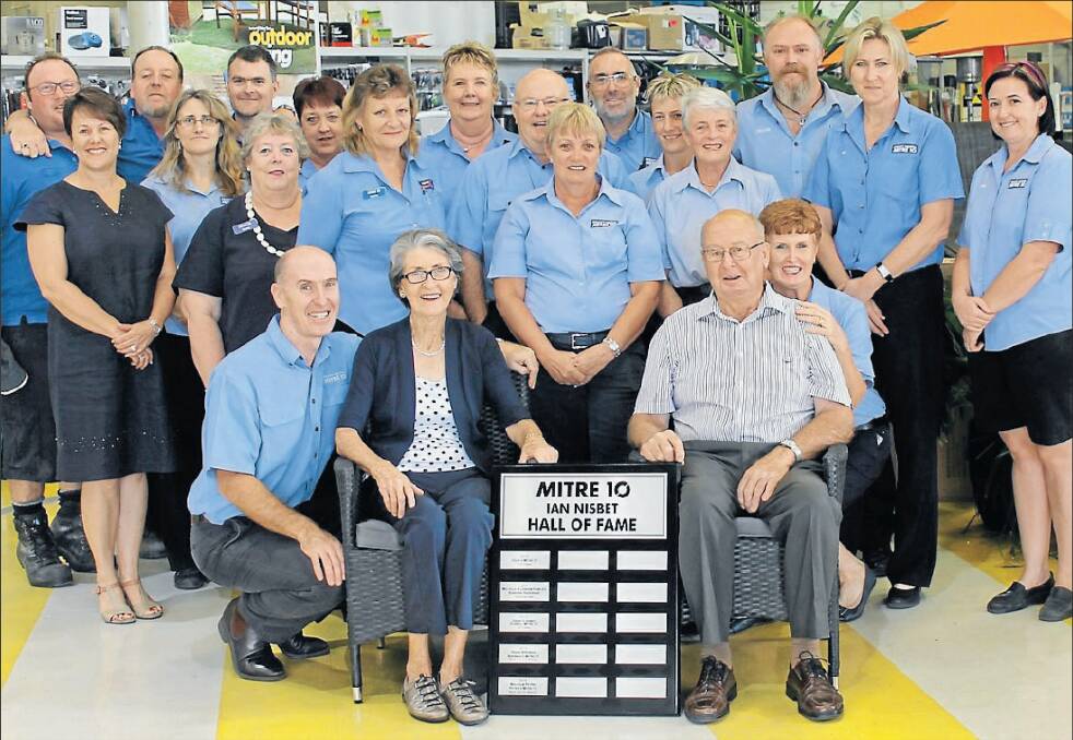 Mal Petrie, pictured with his wife Carmel and Mudgee Mitre 10 staff when he was inducted into the Mitre 10 Hall of Fame in 2015.