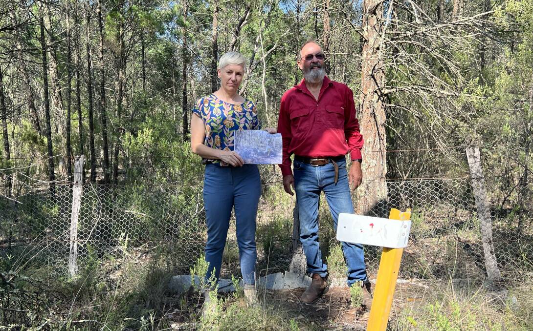 Mick Boller, Lue resident as Cate holds a photo of a Koala sighted in that spot in 2021. Photo: Supplied