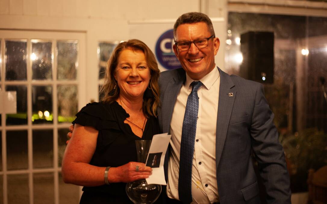 Winemaker Lisa Bray with McGrath Mudgee Real Estate agent Adam Sutherland, celebrating her Winemaker of 2022 award.