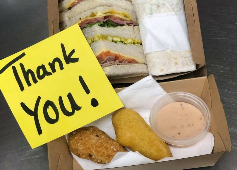 A message from the staff at Ashley's Lunchbox. Photo: Supplied/Myles Ashley