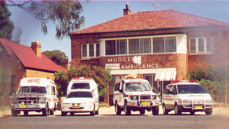 RETRO: Mudgee Ambulance Station - date unknown - with four generations of Ambulance vehicles out the front. Photo: Supplied/David Mangan