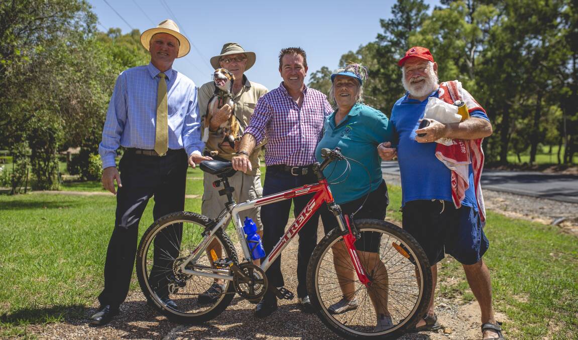 Mid Western Regional Council General Manager Brad Cam and Member for Bathurst Paul Toole MP with local path users.