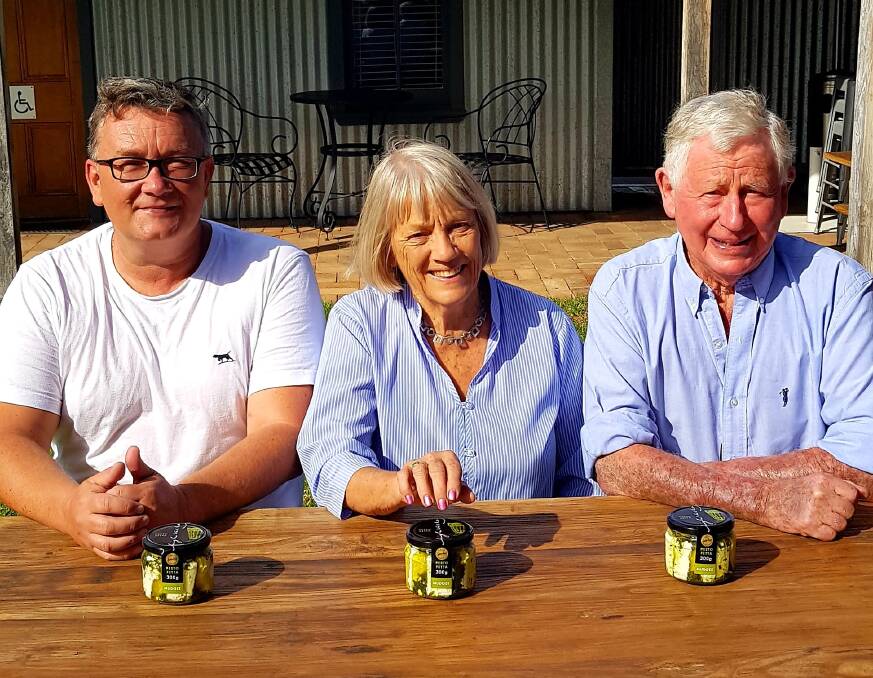 Shaun Barry, Ro Francis and Grosvenor Francis with jars of their award-winning High Valley Pesto Fetta.