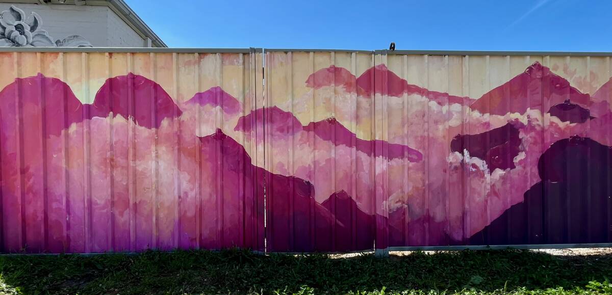 The inclusive underpinnings to a big pink mural on Horatio Street