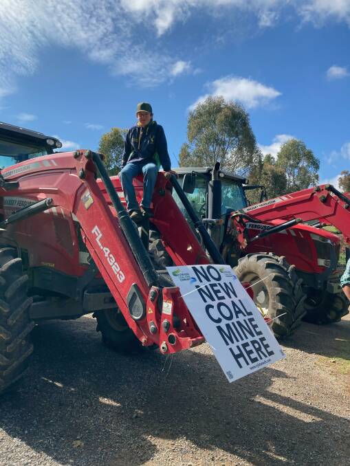 Angus Guilfoyle sitting on a tractor at the muster. Photo: Supplied