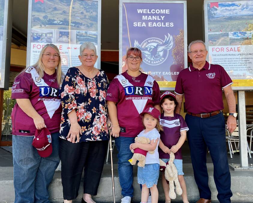 DIE HARDS: Sue Mitchell, Margaret Anthony, Kylie Mitchell, Laylah Angel, Caitlyn Angel and Peter Vanags in Mudgee on Thursday morning showing their Manly pride. Photo: Benjamin Palmer