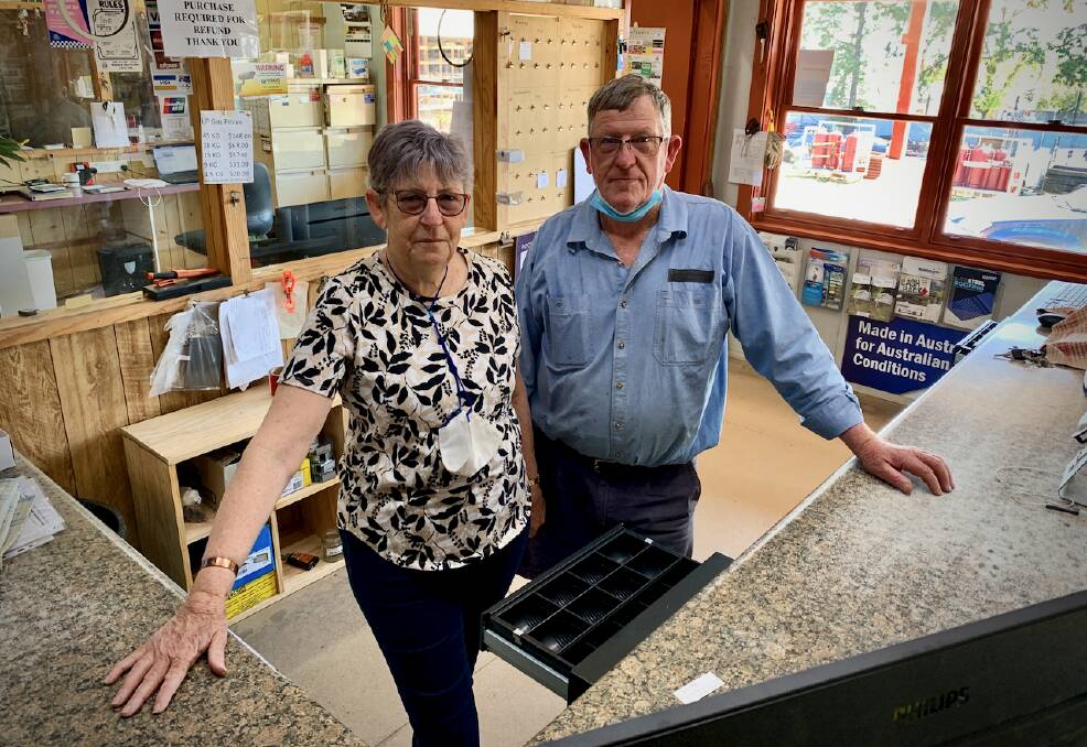 FAREWELL: Pat and Gerald inside Gulgong Timber and Hardware as the store is being changed over. Photo: Benjamin Palmer