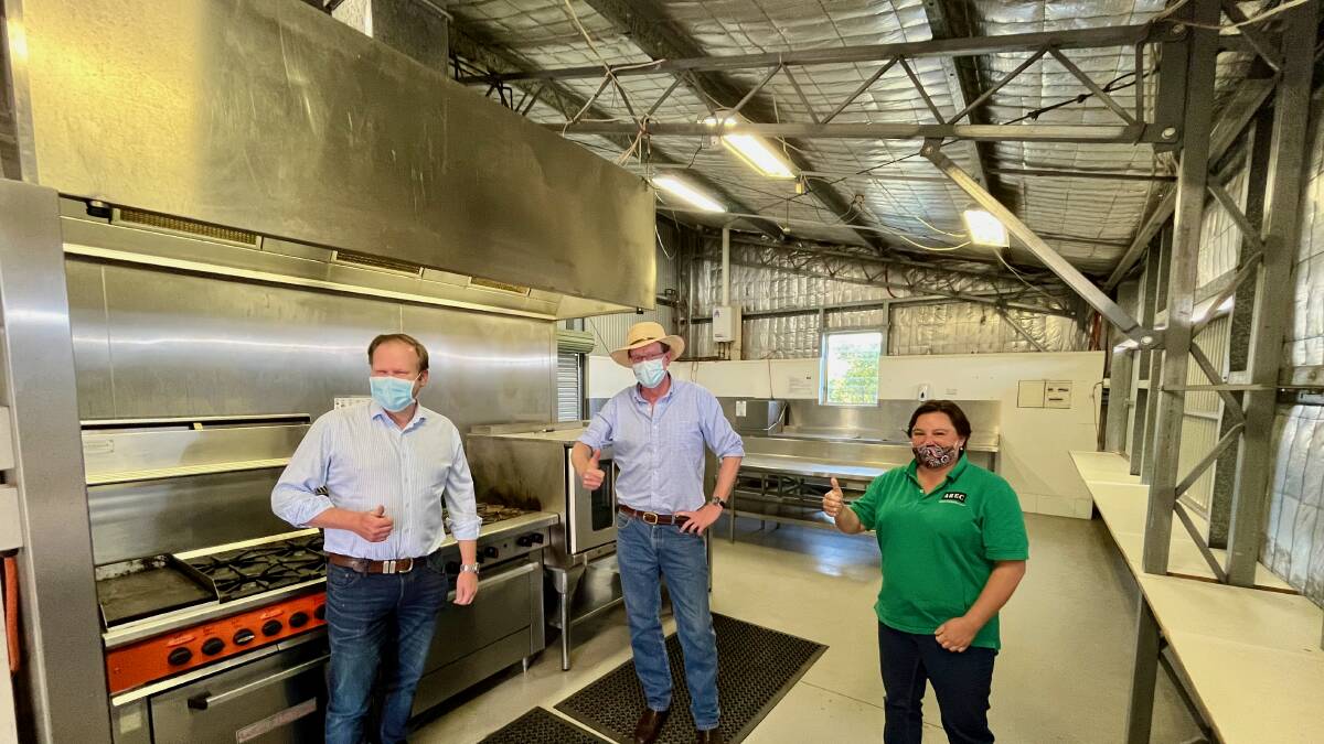 Nationals MP Andrew Gee, AREC General Manager Cassandra Stanford and AREC Chairman James Sullivan inside the kitchen that is set to be upgraded.