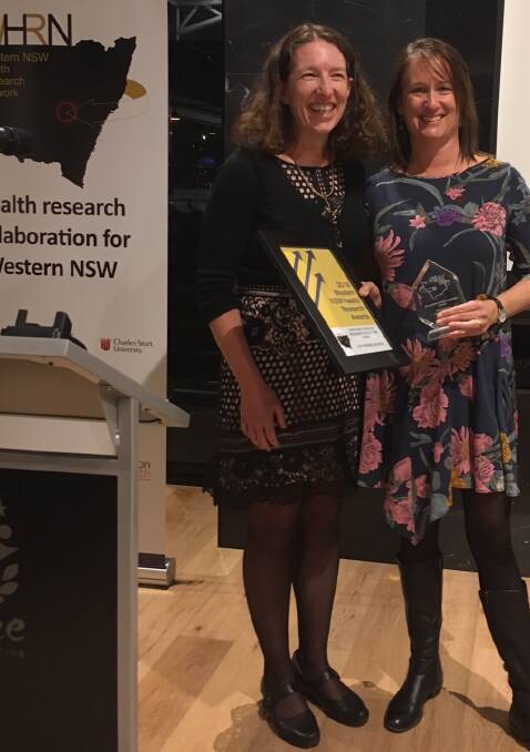 AWARDS NIGHT: Director of Three Rivers Department of Rural Health, Professor Megan Smith with Emerging Researcher, Catherine Bourke. Photo: Supplied 