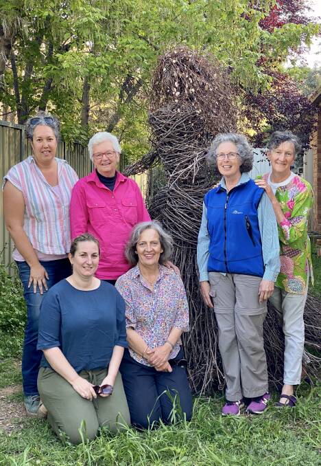 The Second Wednesday Weavers: Kristie Cavanagh,Clare Robeson, Sue Snape, Tamara Bowman, Wendy Arnott and Liz Mayberry posing with Madame Merlot.