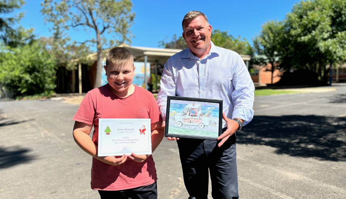 STOKED: 12-year-old Aaron Devenish with Member for Dubbo Dugald Saunders on Monday. Photo: Benjamin Palmer