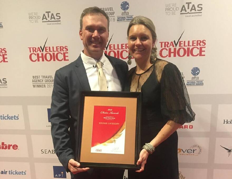 Glenn and Bec Box from Mudgee Travel & Cruise with their award. SUBMITTED