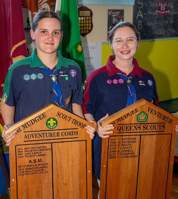 Madison and Holly with their award plaques, cementing their names in history. Photo: Benjamin Palmer