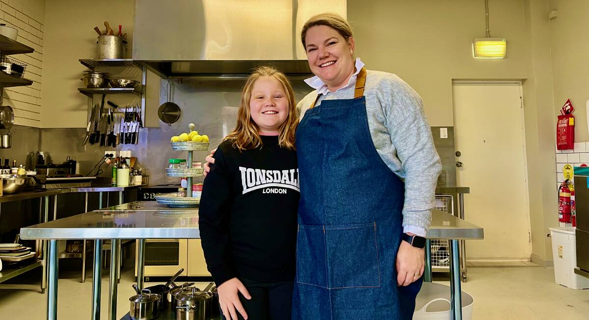 Tamara with her daughter Pip in the kitchen at the Little Cooking School. Photo: Benjamin Palmer