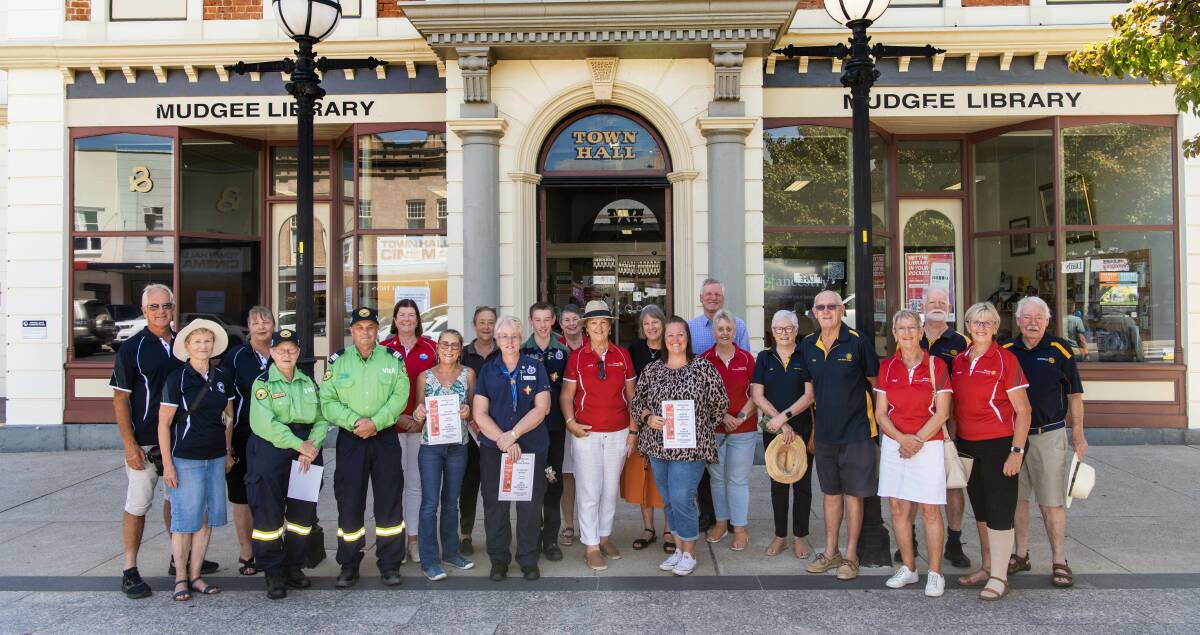 Mudgee's two Rotary groups, joined by Council GM, Brad Cam, outside the Library with the recipient community groups. Photo: Amber Hooper