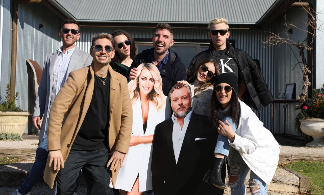 CHUFFED: The KIIS FM crew at The Zin House on Saturday, with cutouts of the show's hosts, Kyle and Jackie O. Photo: Simone Kurtz