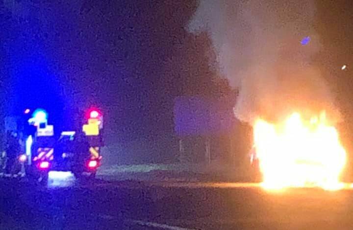 EMERGENCY: A young family and their dog were lucky to escape a blaze that engulfed the car they were driving. Photo: TINA RALPH-TALBOT