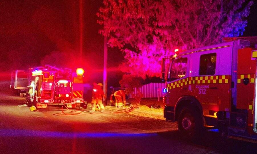 BLAZE: One person has been taken to hospital following an overnight house fire in Mudgee. Photo: PAUL CAVALIER