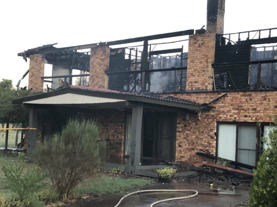 DESTROYED: The top storey of a family home on Rocky Waterhole Road was destroyed during an overnight fire. Photo: SUPPLIED
