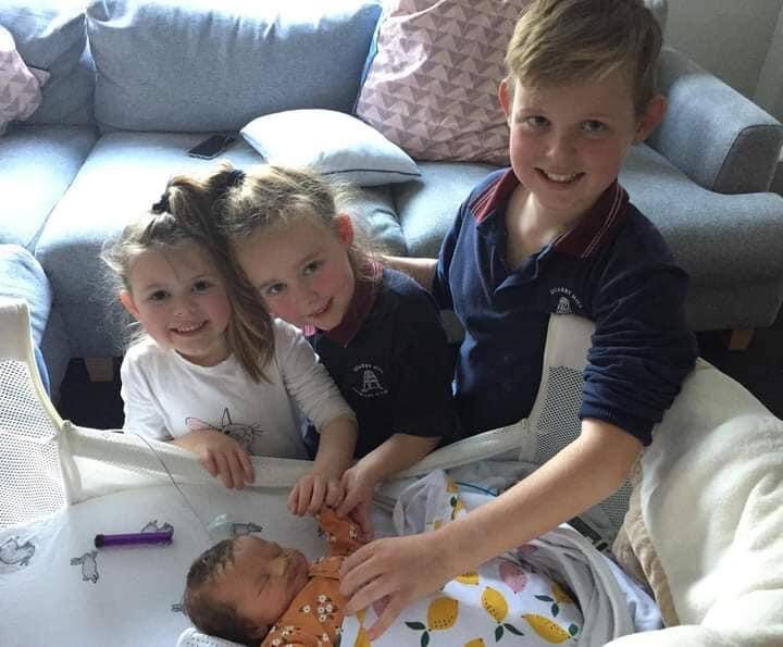 LITTLE SISTER: Ally with her three older siblings, who have never held their younger sister. Picture: supplied