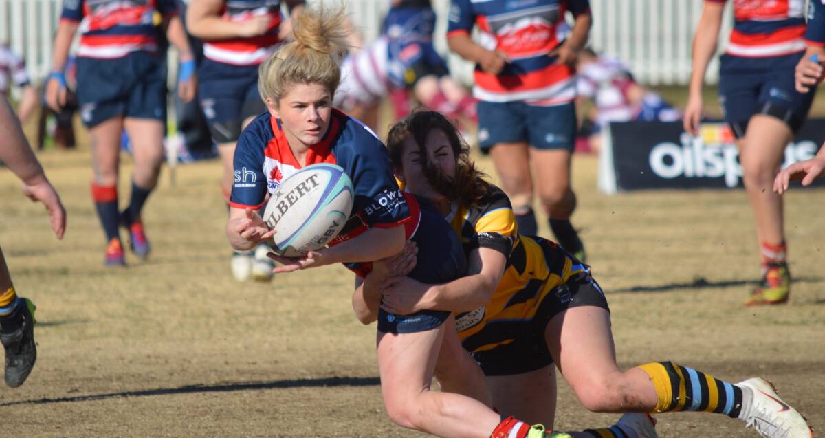 A STRONG CAMPAIGN: Mudgee back Brooke Williams getting her hands on the ball during her side's last runaround of the 2018 season, a 31-0 loss to CSU Bathurst. Photo: Matt Findlay