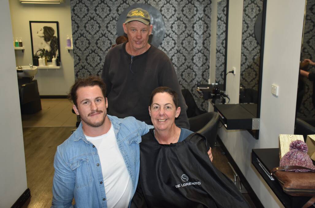 A BRAVE STEP: Jarrod and Terry Hall were at Cheveux Studio studio on Friday as they watched Debbie cut her hair down to a number four. Photo: Jake Humphreys.
