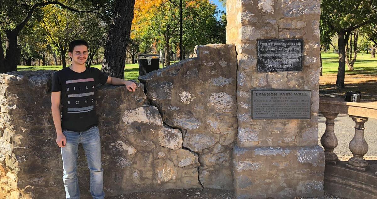 RESTRUCTURE: Councillor Alex Karavas stressed the importance of correcting the deteriorating stone wall at Lawson Park. Photo: Jake Humphreys