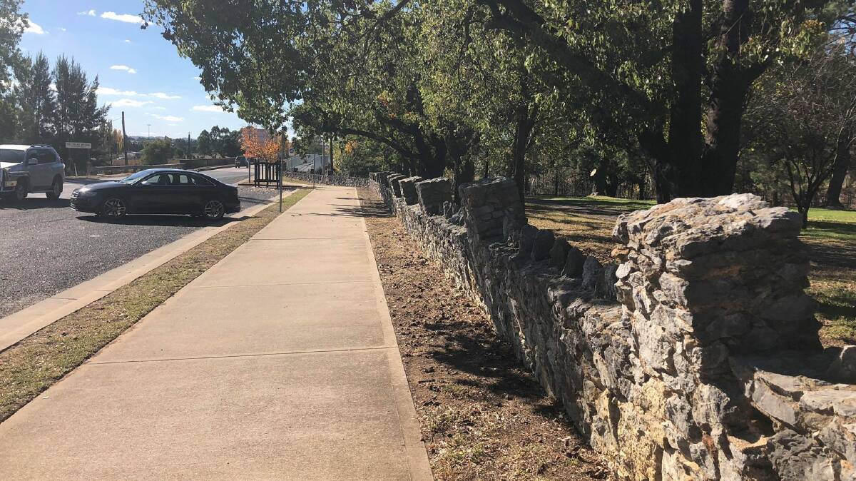 Lawson Park's stone wall between the Church Street entrance and the Holyoake Bridge.

 