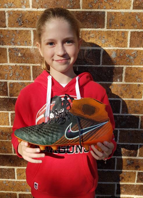 A SMELLY SURPRISE: St George Illawarra back rower Tariq Sims gave Lily Woods his boot after Sunday's NRL game.