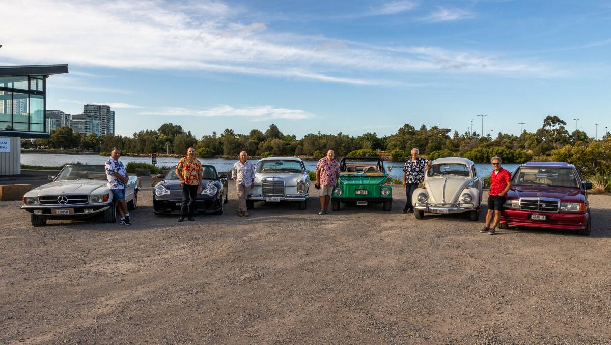 Th 'Old Blokes' and their classic cars. Photo supplied