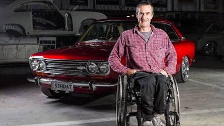 Lithgow's Todd Bulkeley with his red Datsun 1600 SSS Coupe. Photo: Hosking Industries