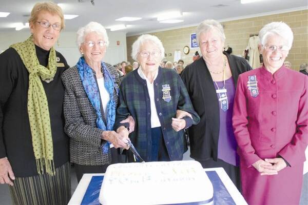 NSW state president Elaine Armstrong, CWA patrons Betty Wilkin and Shirley McQuiggin, Castlereagh Country Group president Jean Monaghan and  Mudgee Day Branch president Marie Croom with the group’s 90th birthday cake on Tuesday.  The Mudgee CWA Day branch is the third oldest in NSW, having been formed in the same year as the organisation. 