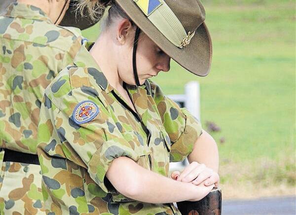HONOUR GUARD: Ashleigh Dellaway from the 1 Platoon Mudgee Australian Army Cadets at Hargraves on Wednesday morning.	260412/anzachargaves/0970