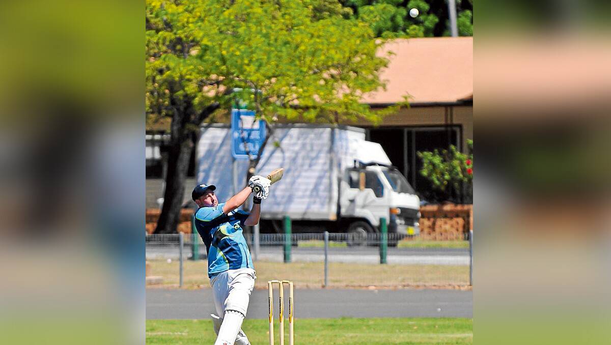 WHOOSHKA: Federal Hotel’s Josh Edwards sends the ball skyward and over the boundary during the first round of the Mudgee cricket Twenty20 competition. Photo: SANDY SMITH  281012sscrick4915