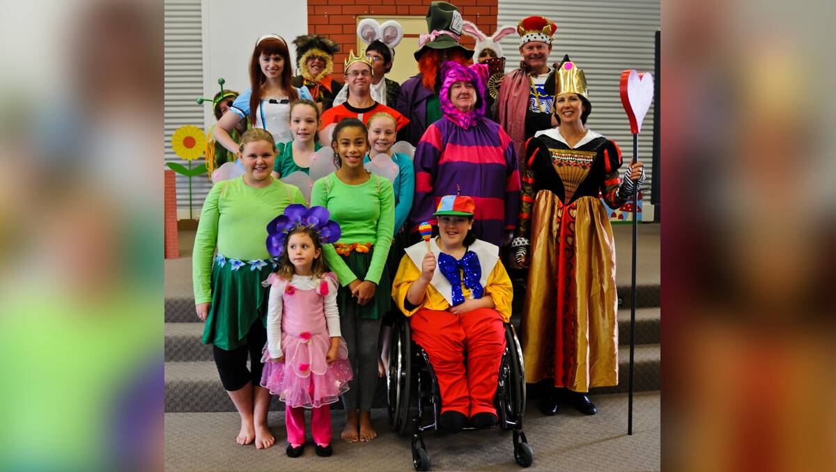 Clients, staff and friends of Mudgee Disability Support Service in costume ready for Alice in Wonderland this Friday night. PHOTO BY SANDY SMITH