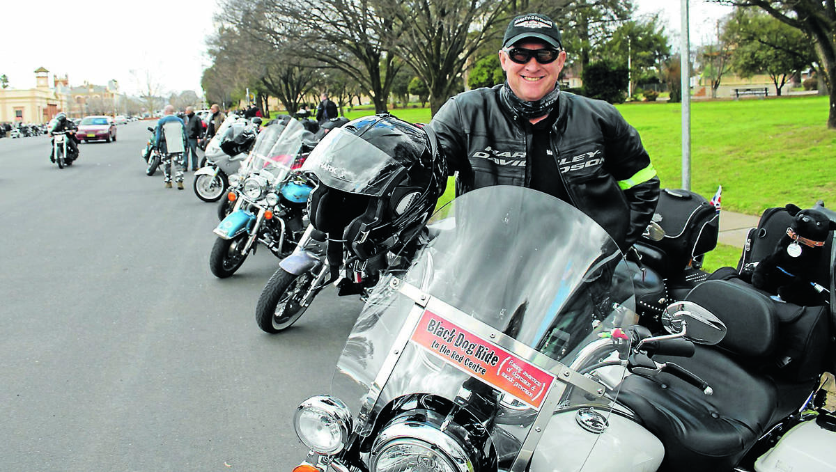 ROAD REPORT: National Nine News reporter Simon Bouda was among the riders rolling through town for the Black Dog Ride to Red Centre on Saturday.