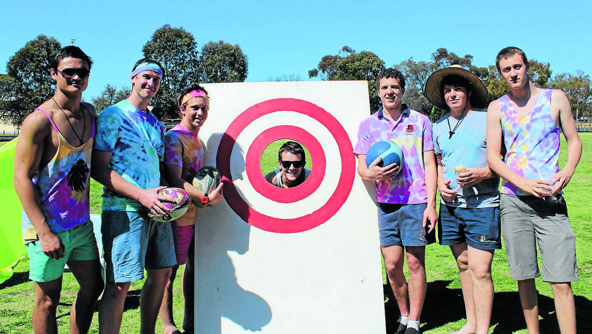 Jeoffrey Wooley, Callan Hawkins, Nathan Chapman, Dylan Brown, Nathan Wurth and Tyler Joyce target their schoolmates for funds. 210912\Rainbow Day 009 