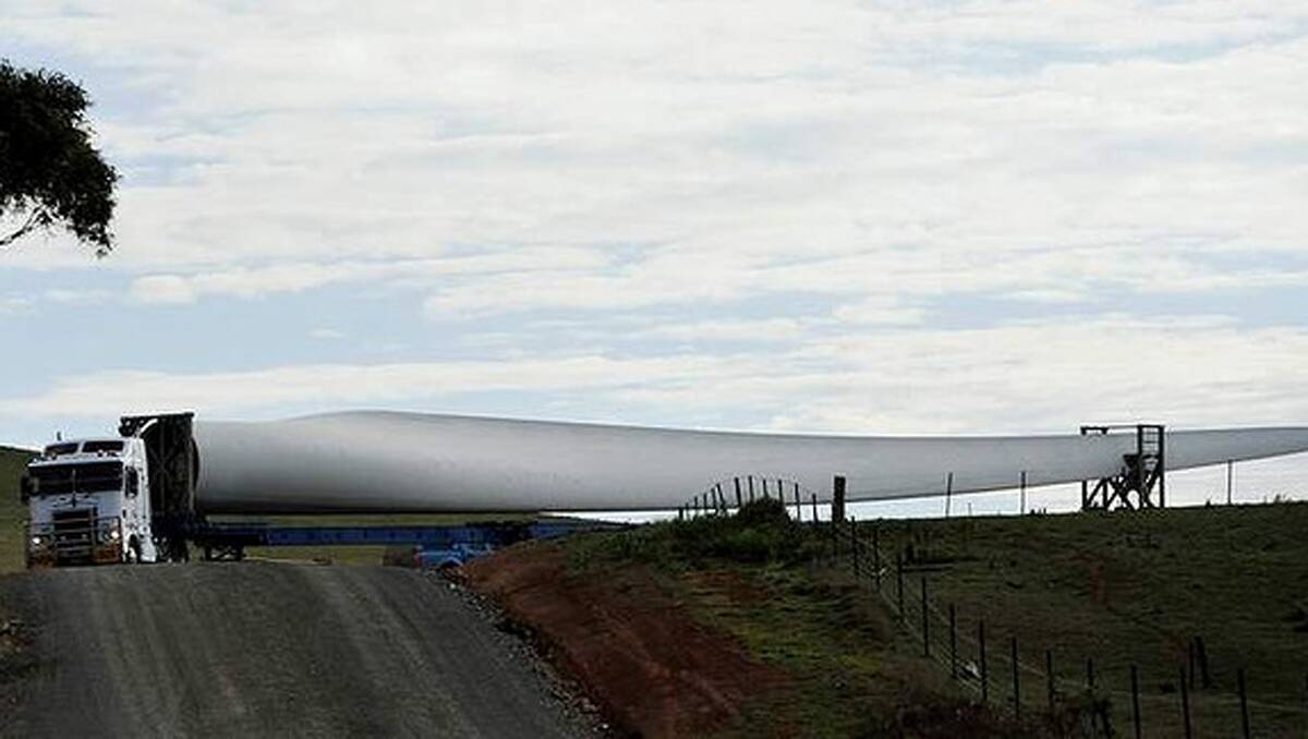 A wind turbine blade arrives at its destination near Crookwell as part of the new Goldwind wind turbine farm. Photo: Jay Cronan 