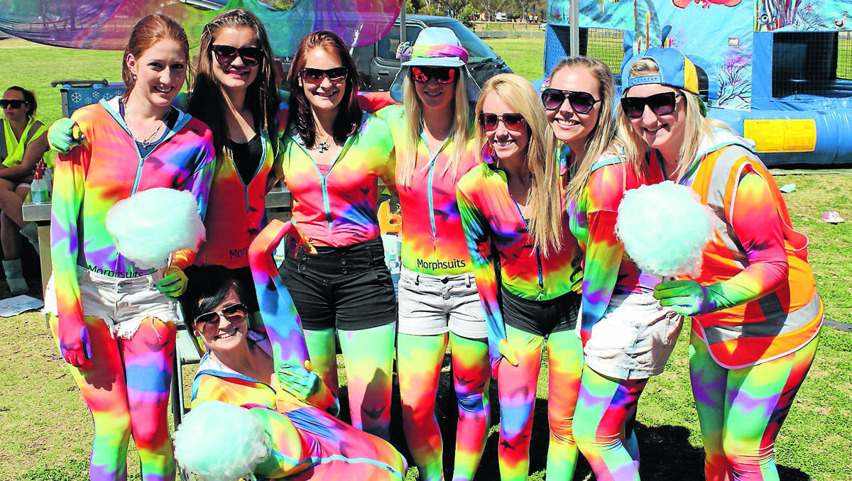 Brielle Croake, Claudia Shearman, Tayla Jones-Porcy, Emily Smith, Jess Winsper, Amy Luckie, Bianca Hughes, Paige Theunissen and Alyce Brown get well into the Rainbow Day spirit. (One of the students is wearing a “morph suit” and her face is not visible) 	210912/RainbowDay/004